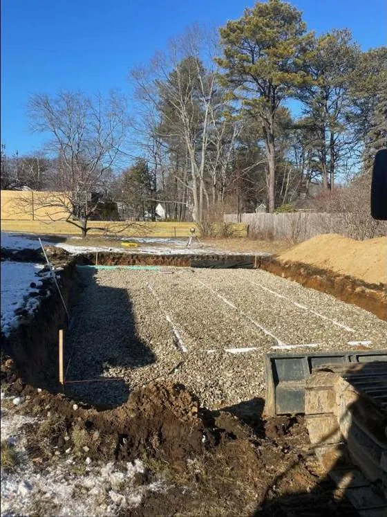 New leach field installed with stone and laterals in a York County backyard